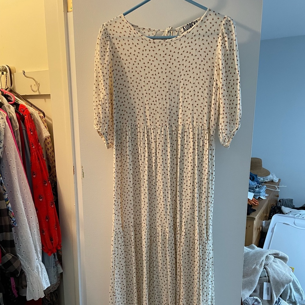 Stevie Hender floral white dress with a tie neck & bubble sleeves